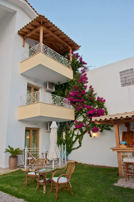 Balconies and bougainvillea above the garden