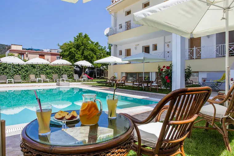 Cool drinks on a table by the pool